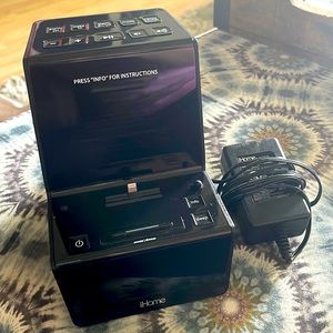 iHome Charging port station with Alarm clock and Radio.